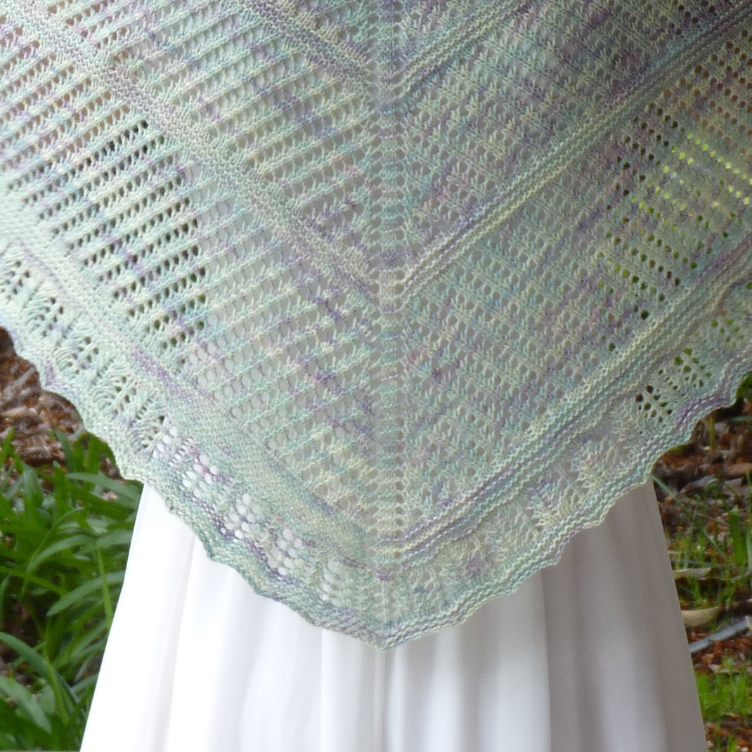 Hand knitted shawl in mint and purple hand dyed yarn.
